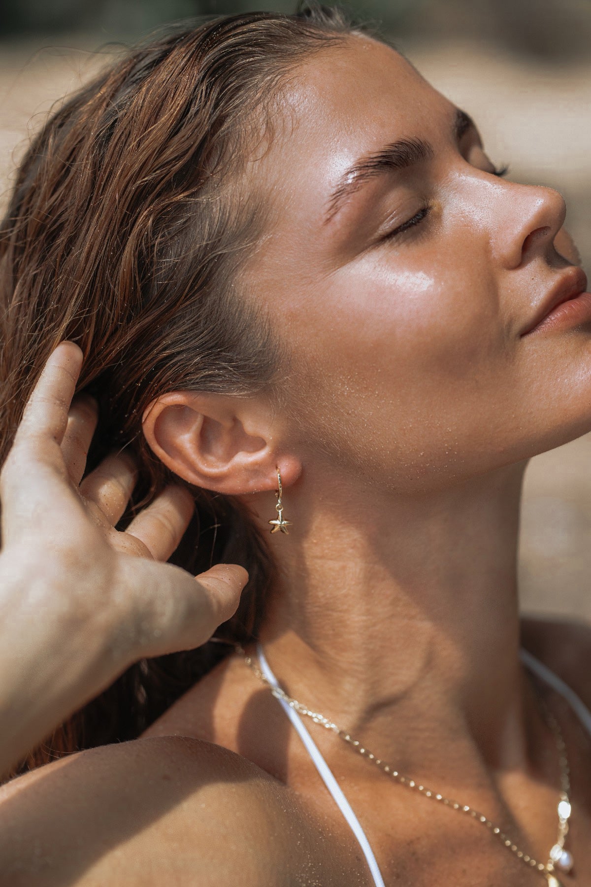Handmade gold-filled starfish huggie earrings, inspired by the ocean, waterproof, tarnish free