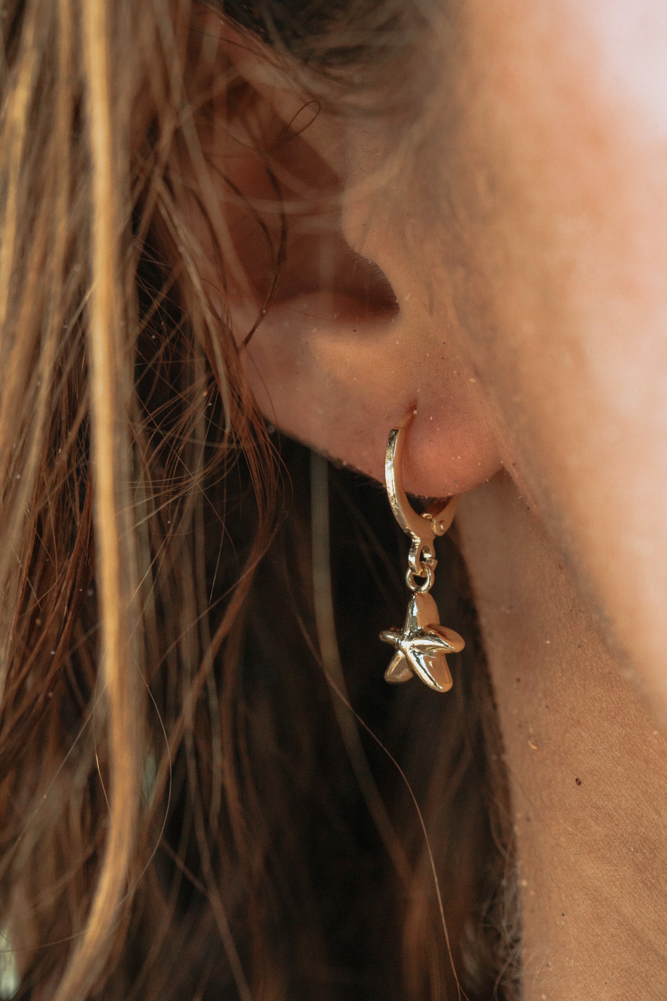 Handmade gold-filled starfish huggie earrings, inspired by the ocean, waterproof, tarnish free