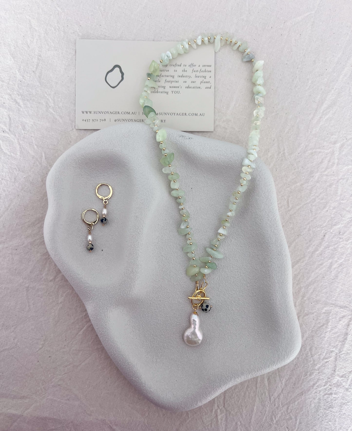 Gold-filled toggle clasp featuring a freshwater baroque pearl and Dalmatian stone on a one-of-a-kind jade necklace.