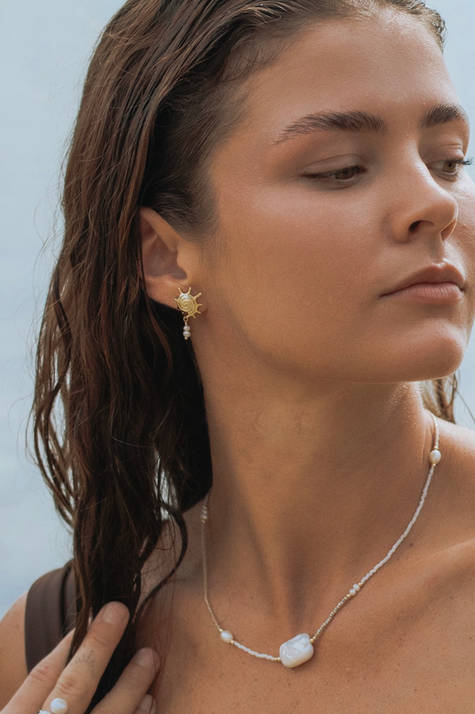 Handmade neutral warm tone necklace featuring freshwater pearls, 18k gold-filled accents, inspired by the meeting of sea and sand. Tarnish free, waterproof beach jewellery